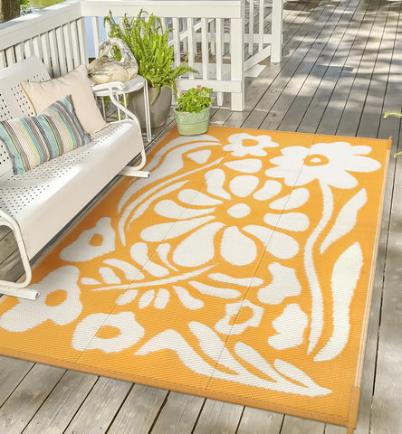 Uphome alfombra frontal naranja floral mostrando diseño y protección