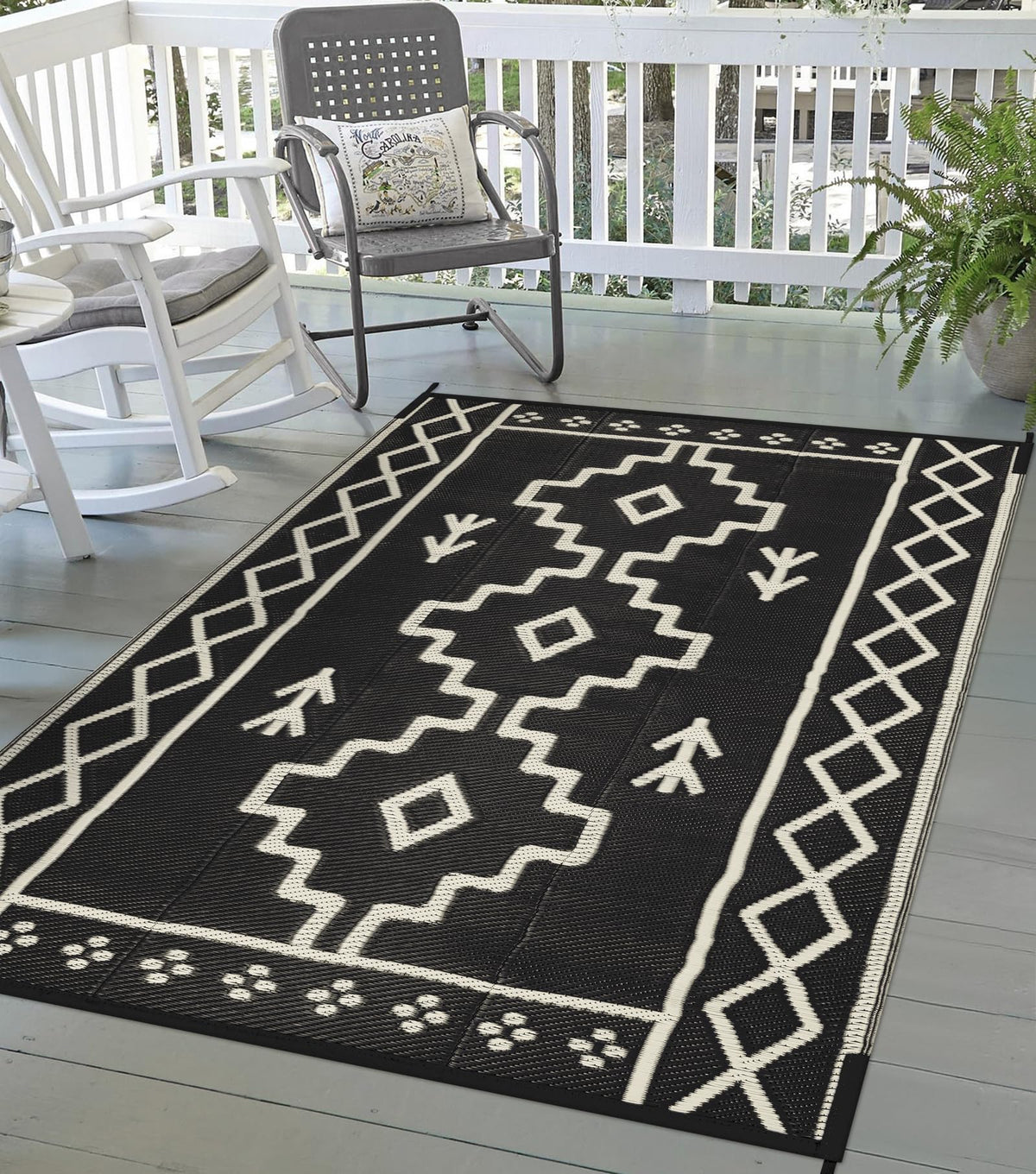 Uphome alfombra exterior frontal mostrando patrón reversible y beneficio estético