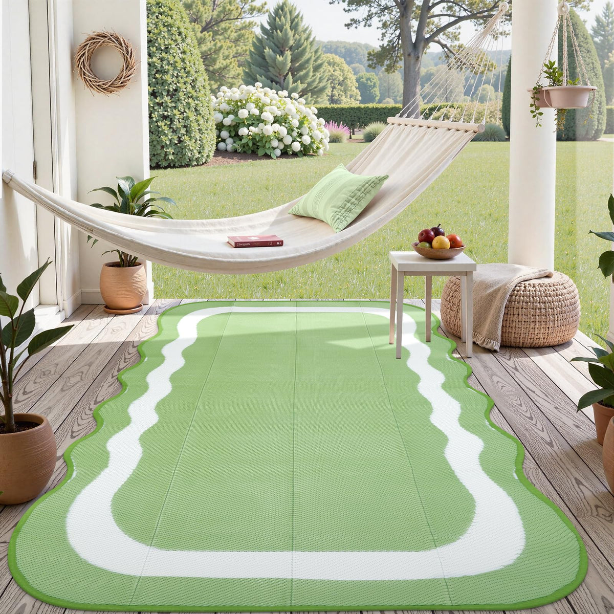 Uphome alfombra exterior frontal mostrando diseño reversible y borde scalloped