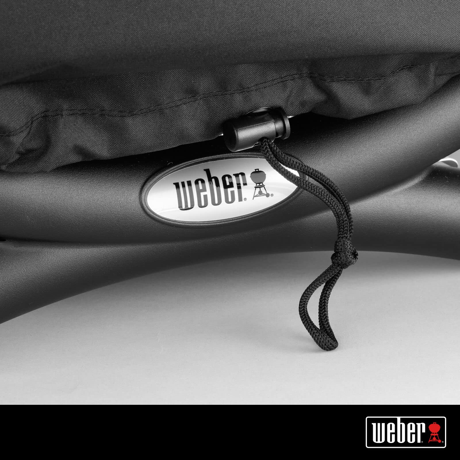 Weber funda colocada en Baby Q demostrando protección completa
