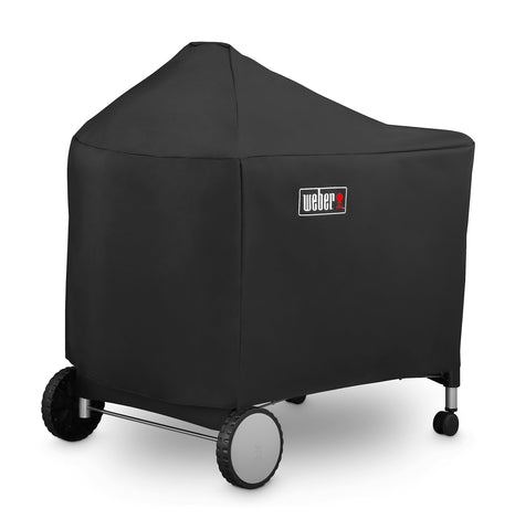 Weber funda frontal ajustada protegiendo parrilla 22" y evitando suciedad