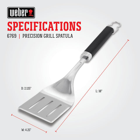 Weber Precision Grill Spatula junto a una regla para comparar tamaño y demostrar su escala práctica