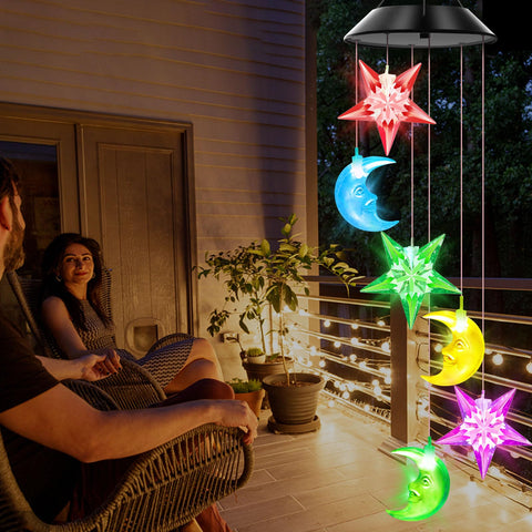 WENANA campana iluminada de noche con colores cambiantes que realzan el jardín